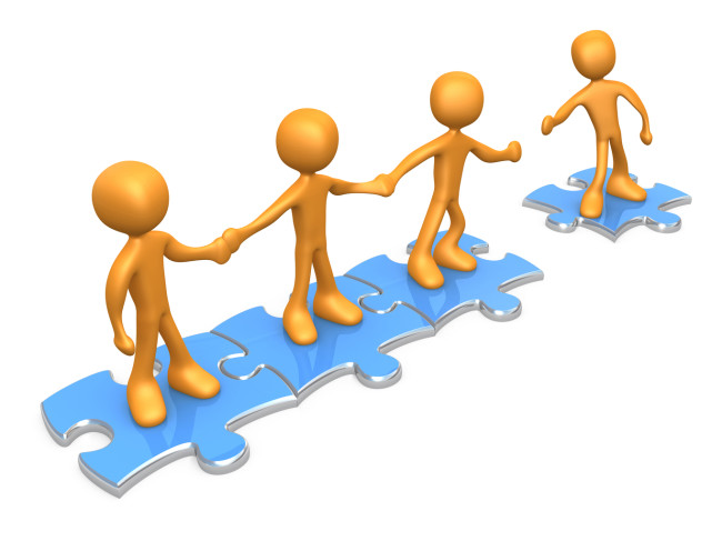 Royalty-free 3d computer generated clipart picture image of a team of three orange people holding hands and standing on blue puzzle pieces, with one man reaching out to connect another to their group, symbolizing teamwork, expansion, membership, seo linking.